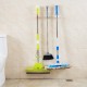 Self-adhesive mop hanger - white - wall holder for brooms Self-adhesive mop hanger - white - wall holder for brooms