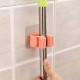 Self-adhesive mop hanger - white - wall holder for brooms Self-adhesive mop hanger - white - wall holder for brooms