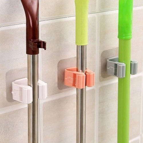 Self-adhesive mop hanger - white - wall holder for brooms Self-adhesive mop hanger - white - wall holder for brooms